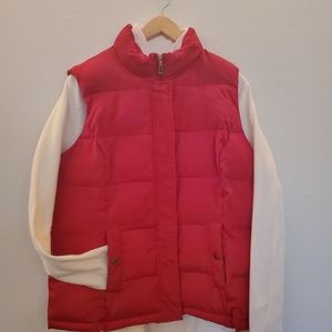 Red vest and white quarter zip